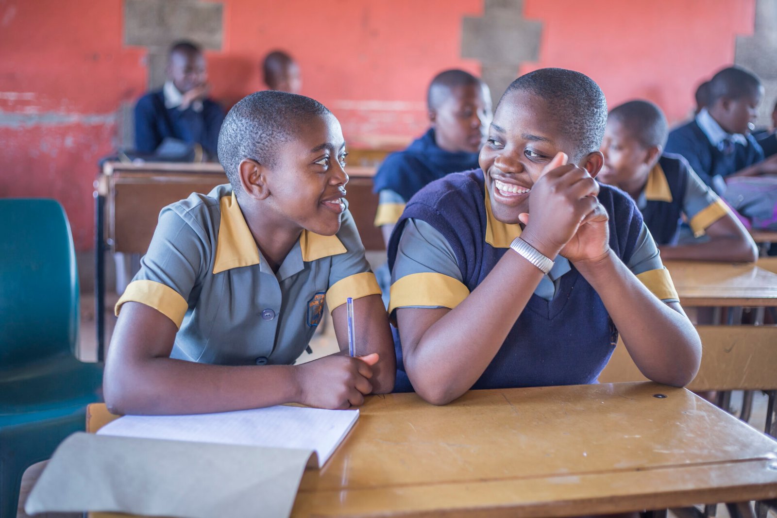 Help Lesotho Learners Smiling, while looking at each other